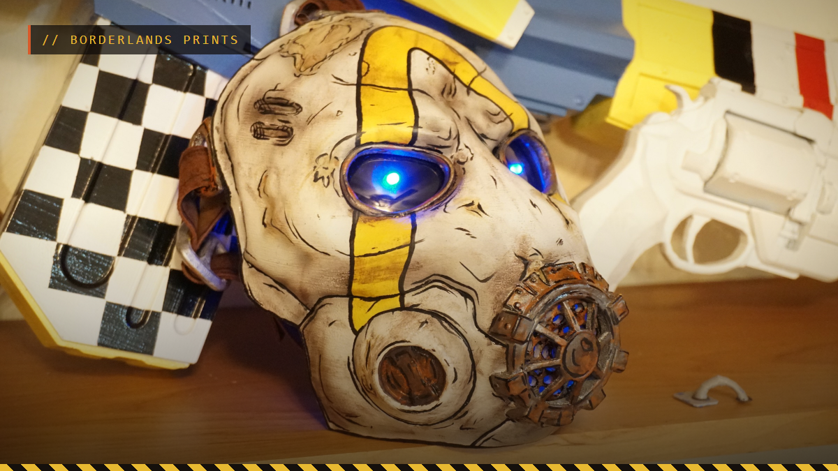 A painted 3D printed Borderlands Psycho mask with glowing blue eyes, by 3D Printing With Sam