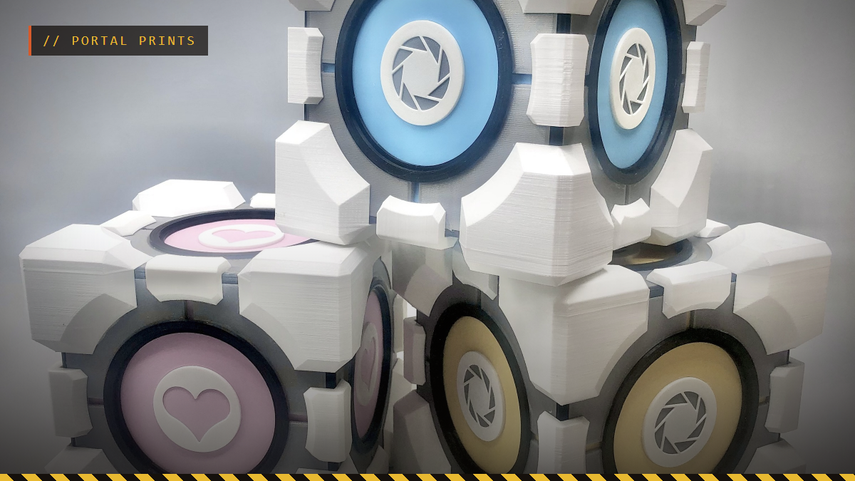 A stack of 3D printed Portal Weighted Storage and Companion Cubes, by 3D Gloop!