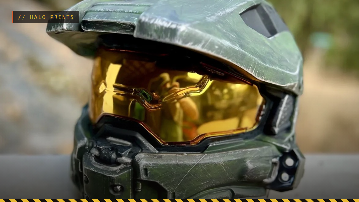 A 3D printed Master Chief helmet with a gold visor and weathered green paint, by Aston Lamport