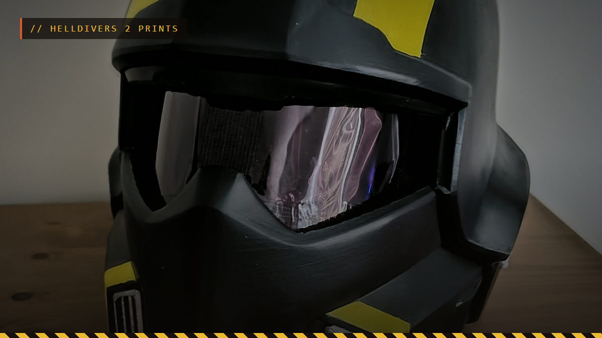 A 3D printed Helldivers 2 B-01 helmet painted black and yellow, by P.etah