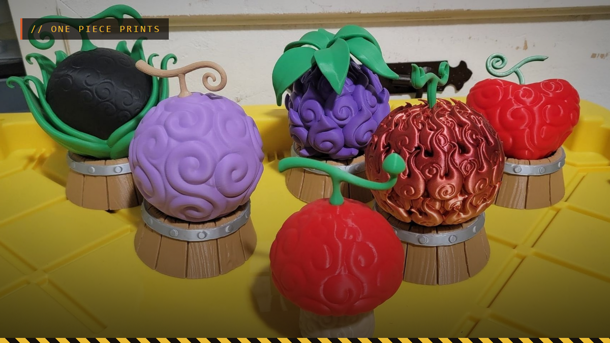 3D printed One Piece devil fruits displayed on barrel stands, by Cory McDonald