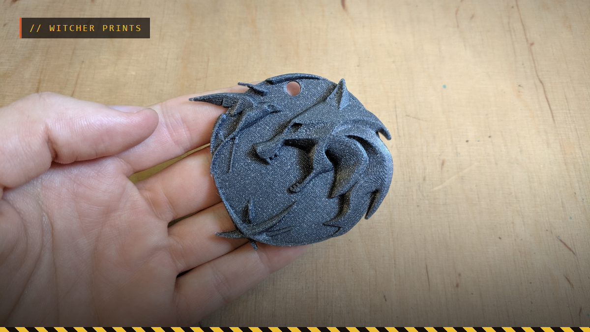 A hand holding a 3D printed Witcher Netflix series amulet, by 3Demon