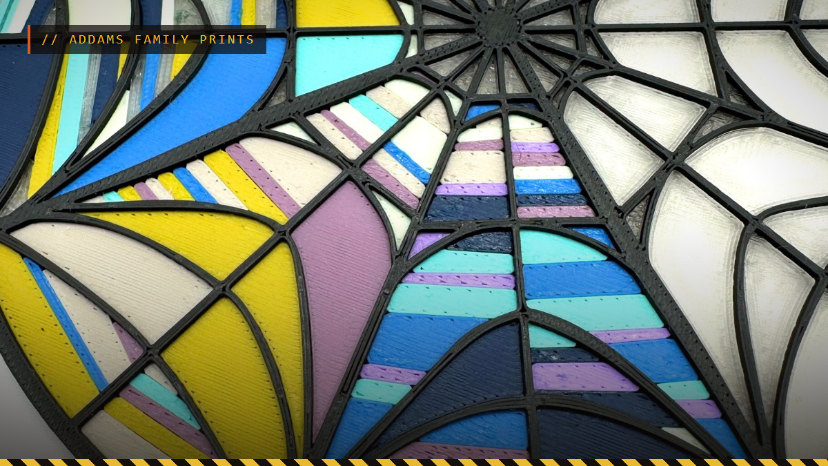 A 3D printed multicolor stained glass spider web window inspired by Wednesday, by Bambu Lab