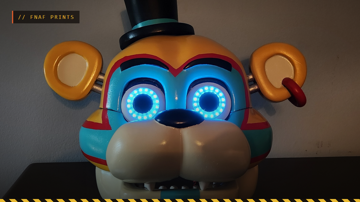 A 3D printed Glamrock Freddy head with glowing blue LED eyes, by Gabgra11