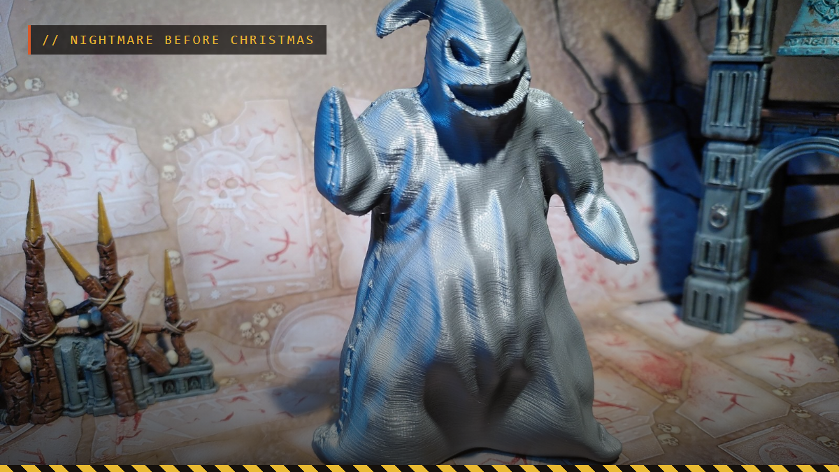 A silver 3D printed Oogie Boogie figure from The Nightmare Before Christmas in a spooky diorama