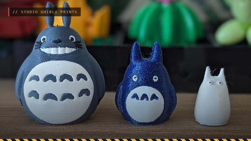 Three 3D printed Totoro finger toys, big, medium and small, by Heidi Makes